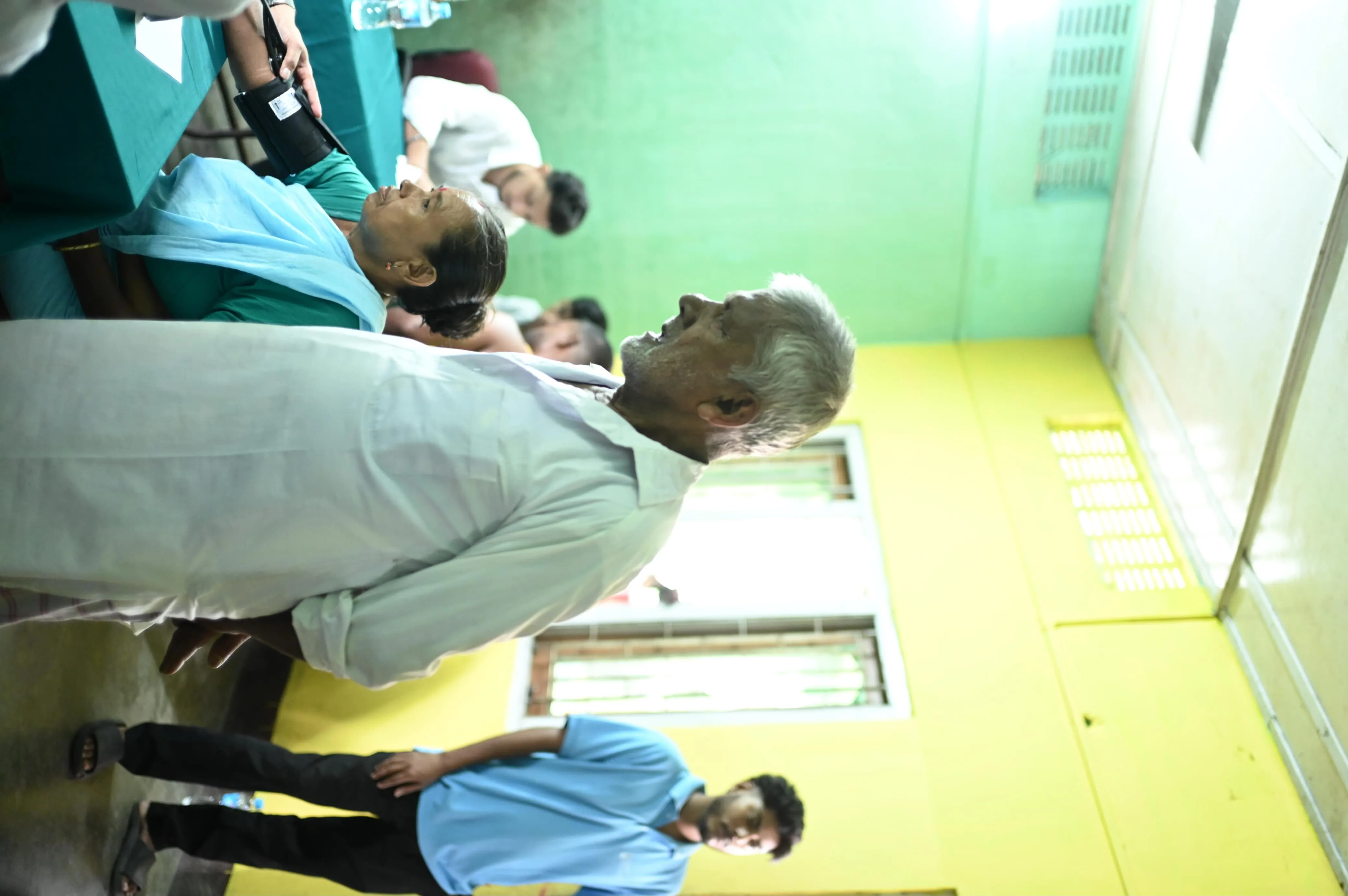 Physician giving guidance to villagers