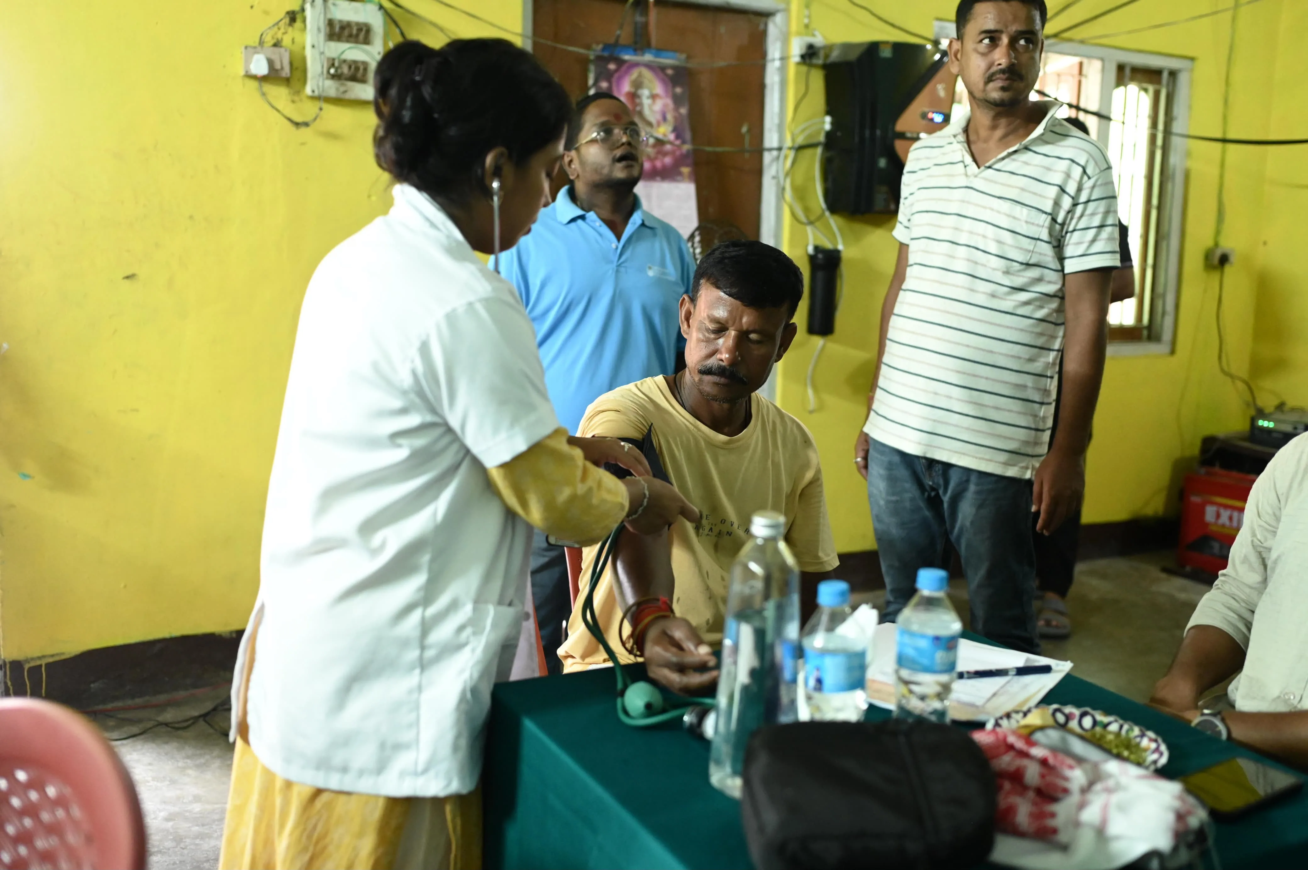 Doctor listening to patient symptoms